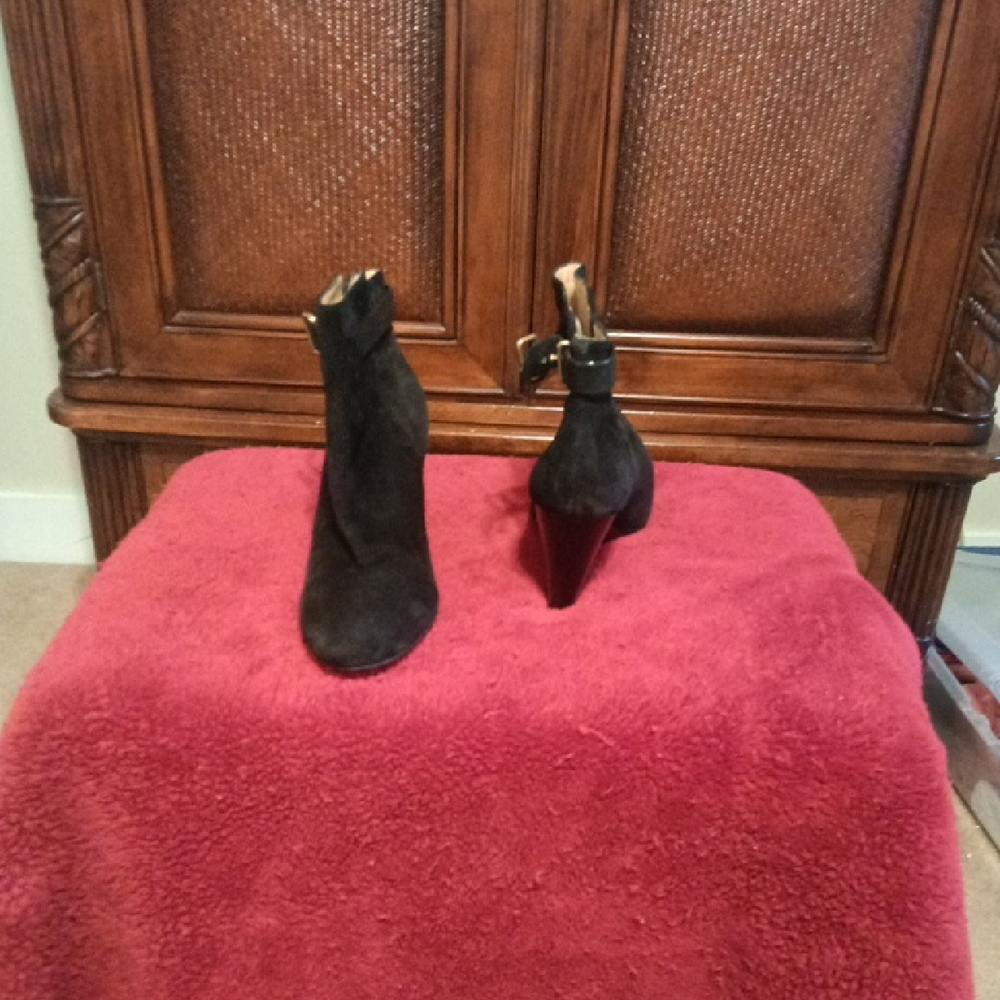 Coach Black Heeled Boots with Sleek Design